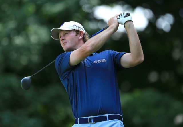 Brandt Snedeker of the US plays his shot from the 11th tee during the third round of the C