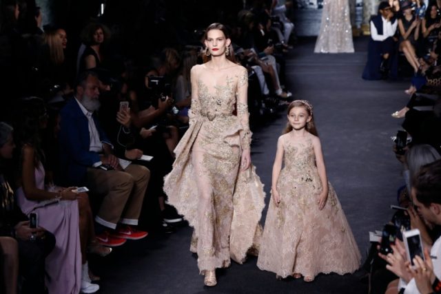 Models present creations by Elie Saab during the 2016-2017 fall/winter Haute Couture colle