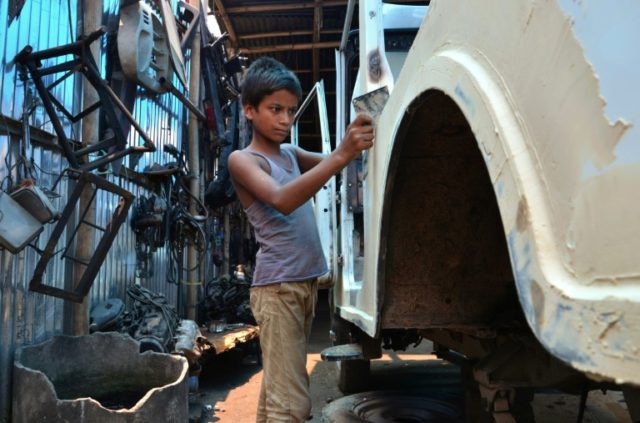 India's parliament approved a ban on all children under 14 from working, except if employe