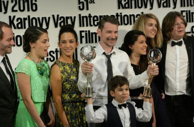 Hungarian film director and actor Szabolcs Hajdu (C) and members of his family team pose w