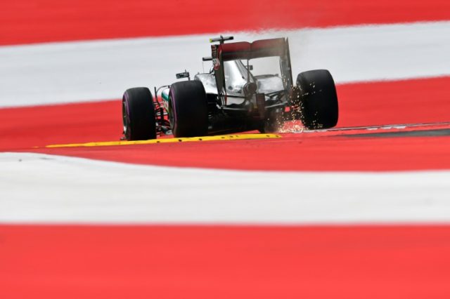 Mercedes driver Nico Rosberg drives during the first practice session for the Austrian Gra