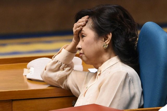 Former Philippine President and now congresswoman Gloria Arroyo attends the legislature se