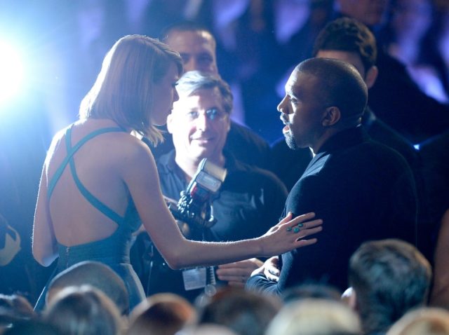 Taylor Swift (left) and Kanye West attend the 2015 Grammy Awards in Los Angeles, Californi