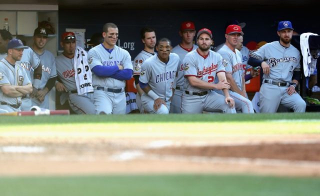 The National League dugout looks on during the 87th Annual MLB All-Star Game at PETCO Park