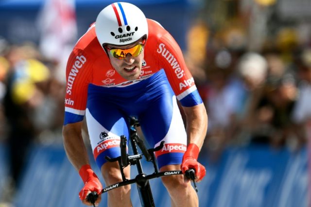 Netherlands' Tom Dumoulin crosses the finish line at the end of the 17 km individual time-