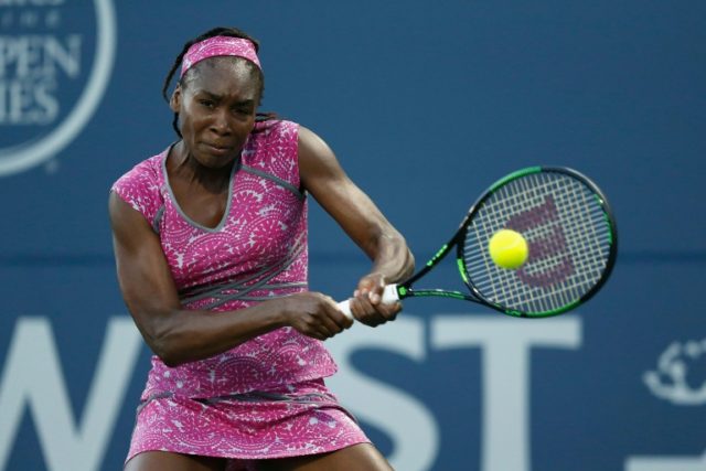 Venus Williams returns to Magda Linette during day three of the Bank of the West Classic i