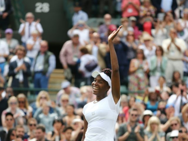 US player Venus Williams celebrates after beating Kazakhstan's Yaroslava Shvedova during t