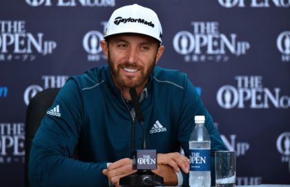 US golfer Dustin Johnson smiles as he speaks to members of the media at a press conference