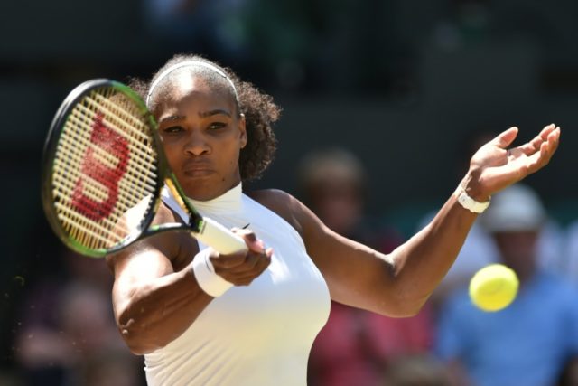 US player Serena Williams hits a return during her 6-2, 6-0 win over Russia's Elena Vesnin