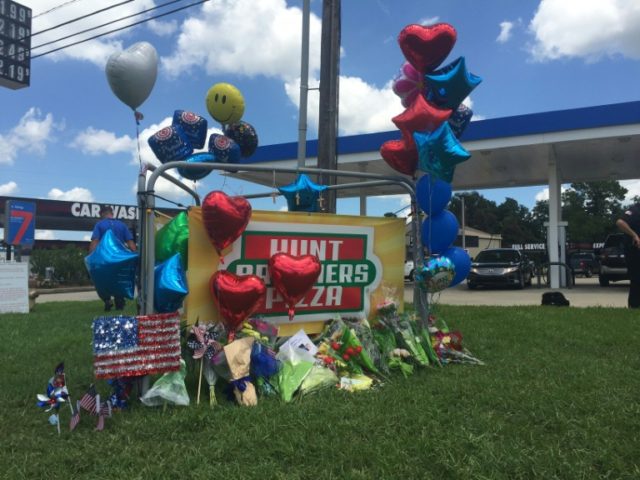 A makeshift memorial at the site of the police shootings in Baton Rouge, Louisiana on July