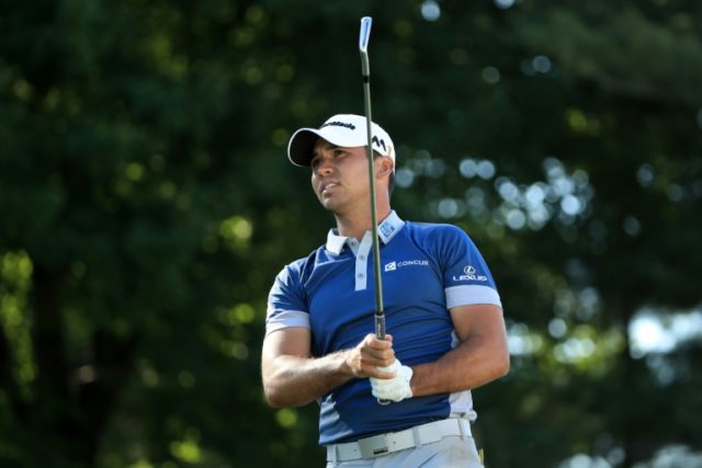 Jason Day of Australia hits off the 17th tee during the second round of the World Golf Cha