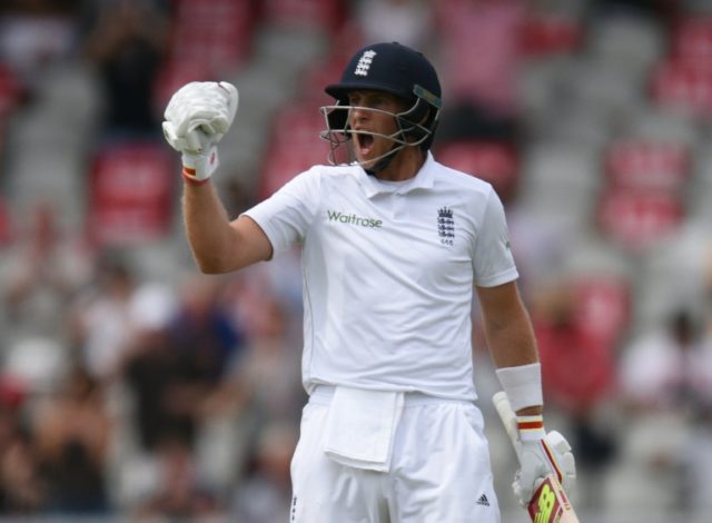 England's Joe Root celebrates reaching 200 on the second day of the second Test against Pa