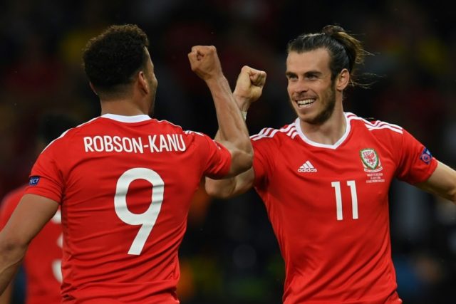 Wales forward Hal Robson-Kanu (L) celebrates after scoring a goal with Gareth Bale (R) dur