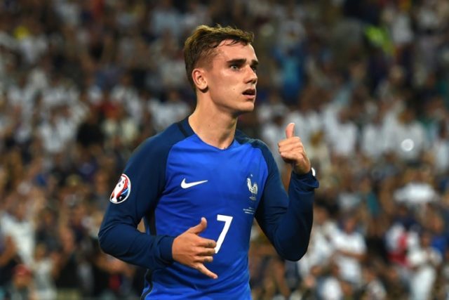 France's forward Antoine Griezmann celebrates after scoring a penalty shot during the Euro