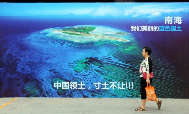 A poster of the South China Sea proclaiming "China's territory, never to yield an inch of