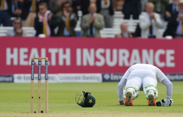 Pakistan's Misbah-Ul-Haq celebrates his century by doing a few press-ups on the first day