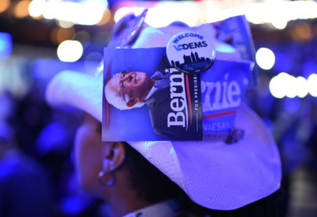 A delegate from Virginia wears a hat supporting Bernie Sanders at the Democratic National