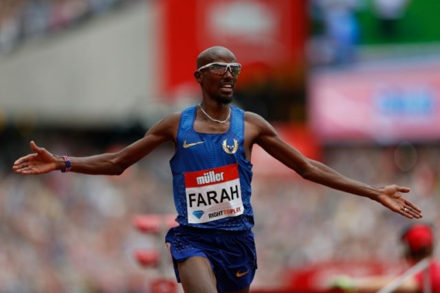 Britain's Mo Farah celebrates winning the men's 5,000 metres during the IAAF Diamond Leagu