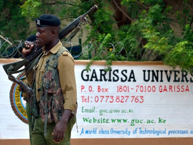 A security officer stands guard at the entrance of Garissa university college in January 2