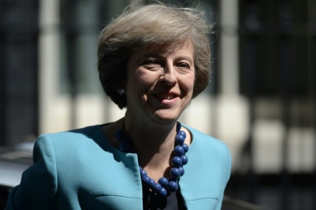 British Prime Minister Theresa May arrives at 10 Downing Street in central London on July