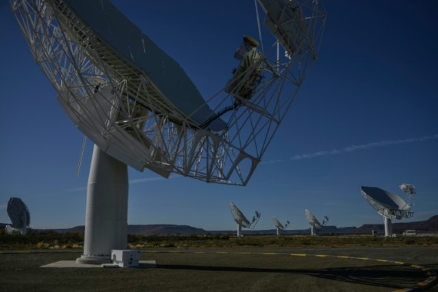 Part of the ensemble of dishes forming South Africa's MeerKAT radio telescope is seen in C