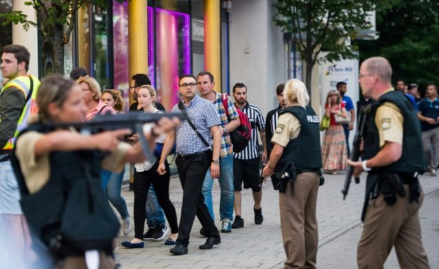 Shoppers rushed away from the Olympia Einkaufzentrum (OEZ) shopping mall in Munich late on