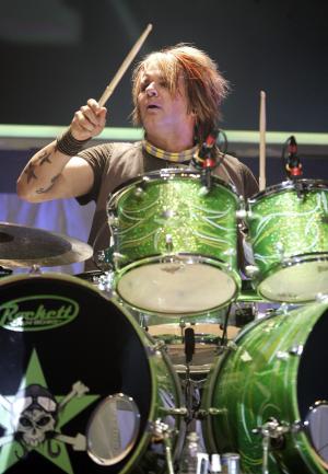 Poison drummer Rikki Rockett announces he is now cancer-free