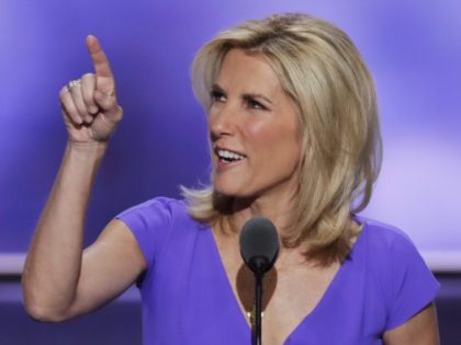 Conservative political commentator Laura Ingraham points toward the media booths as she sp