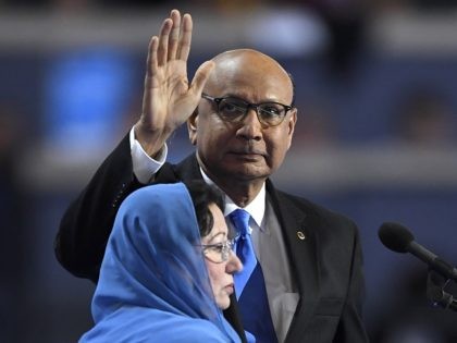 Khizr Khan, father of fallen US Army Capt. Humayun S. M. Khan waves as he stands near the