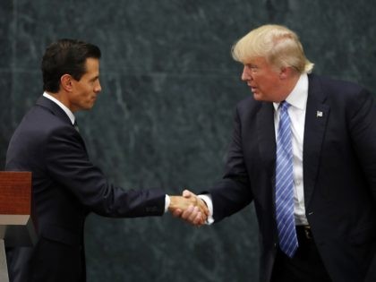 Mexico President Enrique Pena Nieto and Republican presidential nominee Donald Trump shake hands after a joint statement at Los Pinos, the presidential official residence, in Mexico City, Wednesday, Aug. 31, 2016. Trump is calling his surprise visit to Mexico City Wednesday a 'great honor.' The Republican presidential nominee said after …
