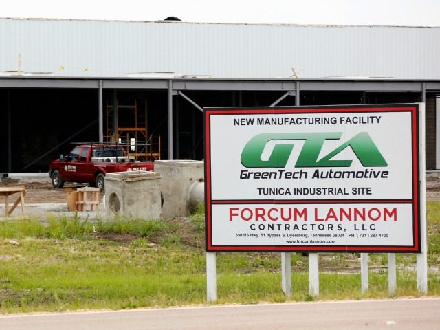In this May 13, 2014 photo, supplies sit at the GreenTech Automotive's plant in Tunic