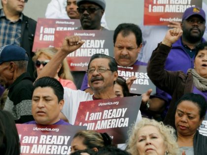 Community activists rally during an event on Deferred Action for Childhood Arrivals, DACA and Deferred Action for Parental Accountability, DAPA in downtown Los Angeles, Tuesday, Feb. 17, 2015. The White House promised an appeal Tuesday after a federal judge in Texas temporarily blocked President Barack Obama's executive action on immigration …