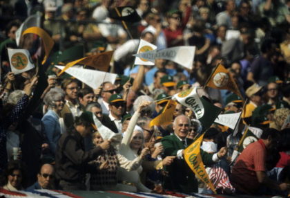 Baseball: World Series: Oakland Athletics owner Charlie Finley (green suit) in stands duri