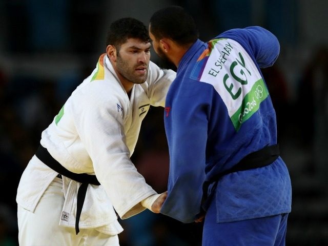 Or Sasson of Israel (white) competes against Islam El Shehaby of Egypt in the Men's +