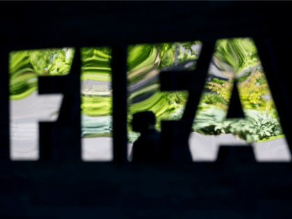 ZURICH, SWITZERLAND - JUNE 03: A FIFA logo sits next to the entrance at the FIFA headquart