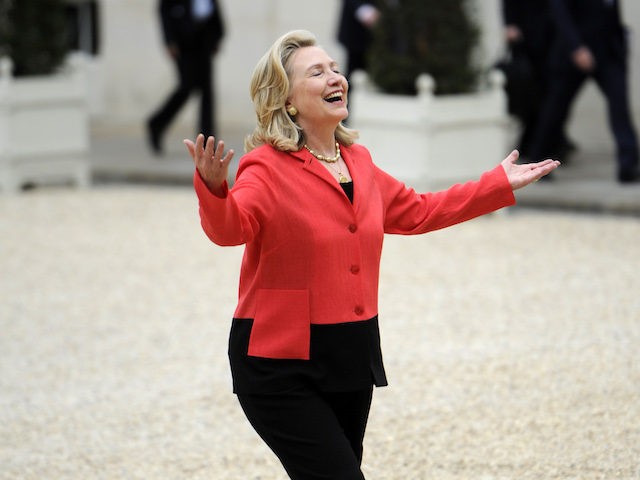 US secreatry of State Hillary Clinton gestures as she arrives at the Elysee palace for a m