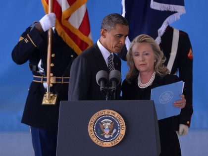US President Barack Obama and Secretary of State Hillary Clinton attend the transfer of remains ceremony marking the return to the US of the remains of the four Americans killed in an attack this week in Benghazi, Libya, at the Andrews Air Force Base in Maryland on September 14, 2012. …