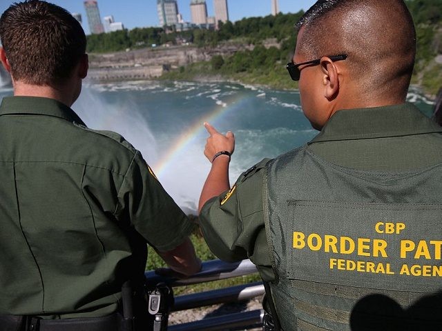 NIAGARA FALLS, NY - JUNE 04: A rainbow forms in the mist of Niagara Falls as U.S. Border