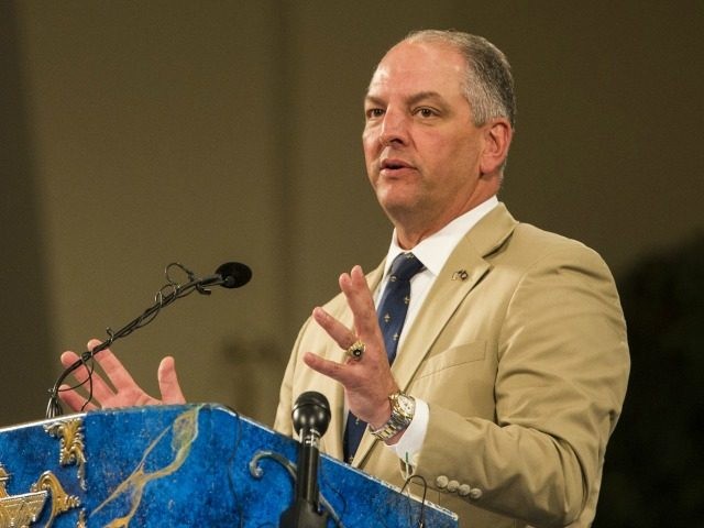 Governor John Bel Edwards of Louisiana speaks during a prayer vigil for Alton Sterling at the Living Faith Christian Center July 7, 2016 in Baton Rouge, Louisiana. Alton Sterling was shot by a police officer in front of the Triple S Food Mart in Baton Rouge on July 5th, leading …