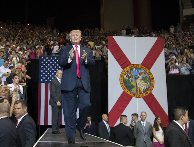 JACKSONVILLE, FL - AUGUST 03: Republican presidential nominee Donald Trump makes his entrance during a rally at Jacksonville Veterans Memorial Arena on August 3, 2016 in Jacksonville, Florida. Trump has had to answer concerns from inside the Republican party that his campaign is in disarray. (Photo by Mark Wallheiser/Getty Images)