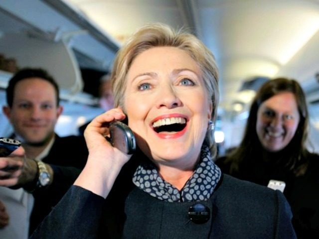 Democratic presidential hopeful, Sen. Hillary Rodham Clinton, D-N.Y., talk on the phone wi