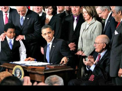 Obama Signs Obamacare Getty
