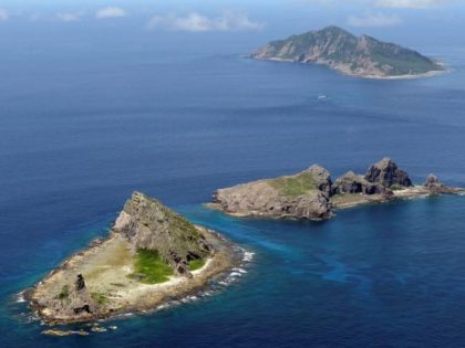 File photo taken in September 2012 shows (from front) Minamikojima, Kitakojima and Uotsuri islands of the Senkaku Islands in the East China Sea. The Chinese army is weighing the full use of unmanned aircraft to regularly monitor the East China Sea, a move that may add fuel to heightened tension …
