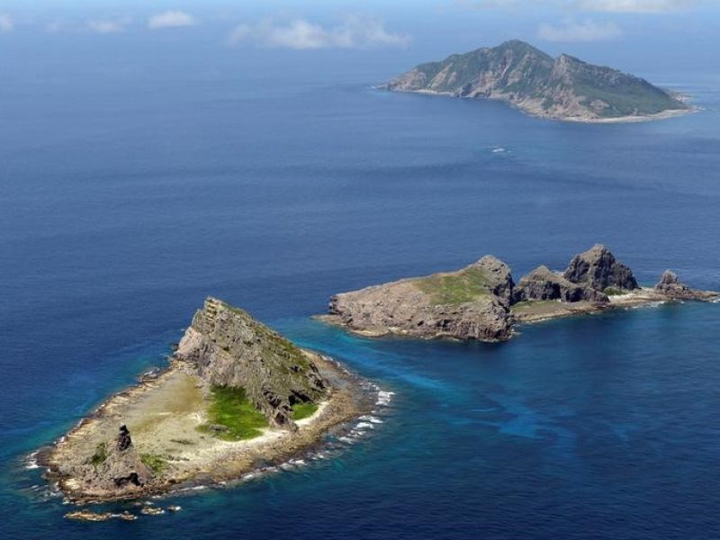 File photo taken in September 2012 shows (from front) Minamikojima, Kitakojima and Uotsuri islands of the Senkaku Islands in the East China Sea. The Chinese army is weighing the full use of unmanned aircraft to regularly monitor the East China Sea, a move that may add fuel to heightened tension in the area where Japanese-controlled islands claimed by China lie, a Chinese document on the country's use of drones showed June 12, 2015. (Kyodo via AP Images)