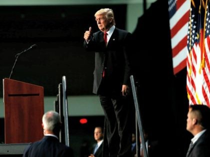 CHARLOTTE, NC - AUGUST 18: Republican presidential candidate Donald Trump gestures to sup