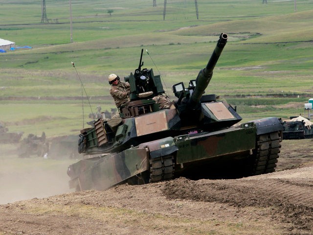 U.S. M1A2 Abrams tank moves to firing positions during joint military exercises at the Vaz