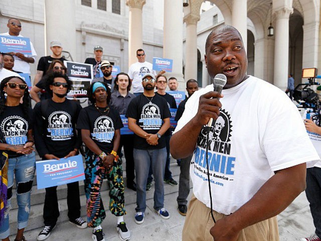 LOS ANGELES, CA - JUNE 03, 2016 - Bruce Carter founder of 'Black Men for Bernie' talks to supporters in front of Los Angeles City Hall Friday morning June 3, 2016. Traveling in a tour bus wrapped in this slogan the group is campaigning for the presidential candidate Bernie Sanders. (Photo by Al Seib/Los Angeles Times via Getty Images)