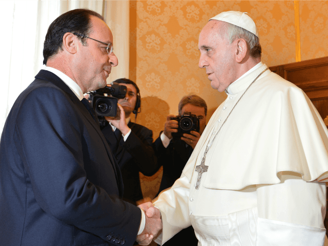 France's President Francois Hollande (L) meets with Pope Francis during a private aud