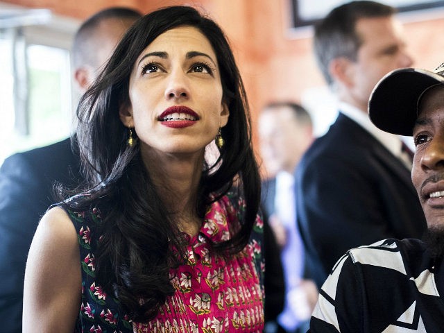 NEWARK, NJ - With New Jersey voters sitting at the counter, senior Hillary Clinton staffer Huma Abedin helps her boss Democratic Candidate for President former Secretary of State Hillary Clinton order during a quick stop at Omar's in Newark, New Jersey on Wednesday, June 1, 2016. (Photo by Melina Mara/The …