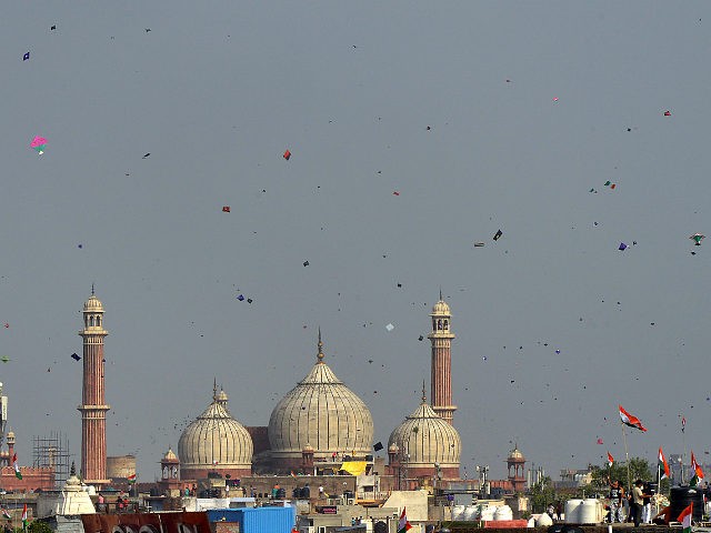DELHI, INDIA AUGUST 15: People fly kites from the roof of their houses on the occasion of India's Independence Day in New Delhi.(Photo by K Asif/India Today Group/Getty Images)